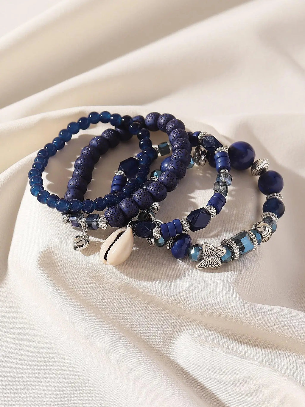 4-Piece Layered Blue Beaded Bracelet Set with Butterfly & Shell Charms