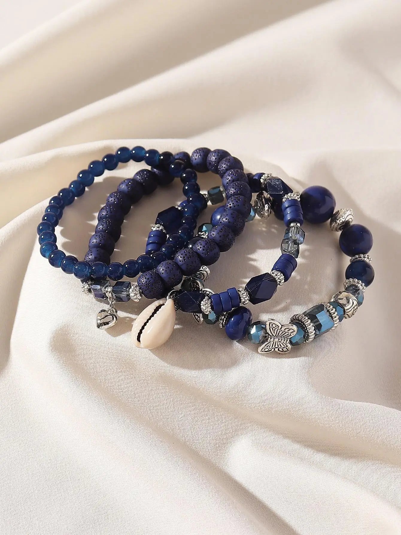 4-Piece Layered Blue Beaded Bracelet Set with Butterfly & Shell Charms