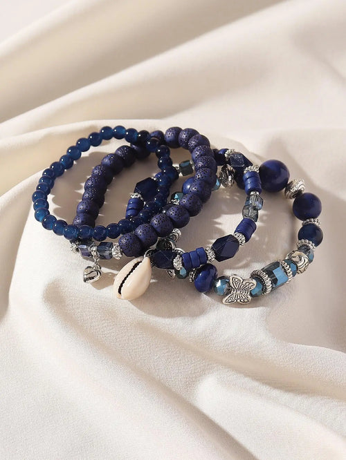 4-Piece Layered Blue Beaded Bracelet Set with Butterfly & Shell Charms