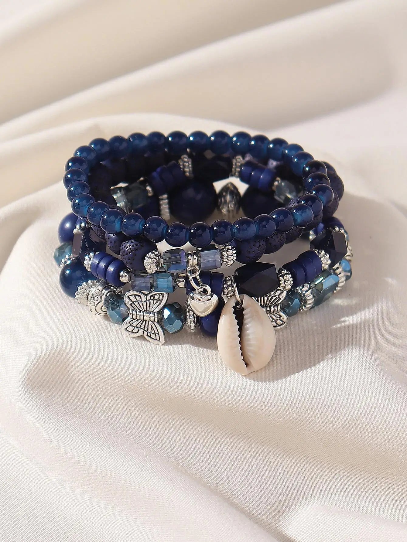 4-Piece Layered Blue Beaded Bracelet Set with Butterfly & Shell Charms